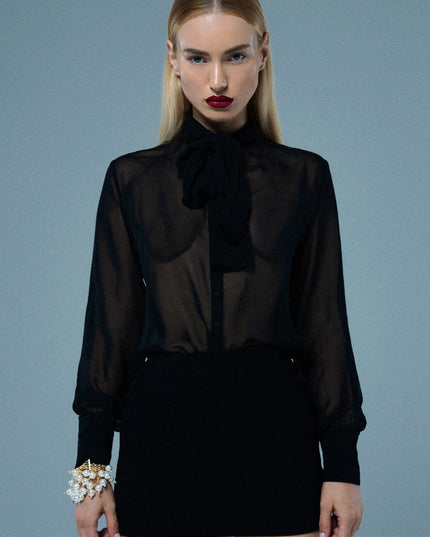 Sheer tie neck shirt in chiffon.