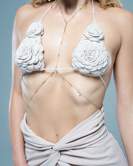 Hand knit flower bra.